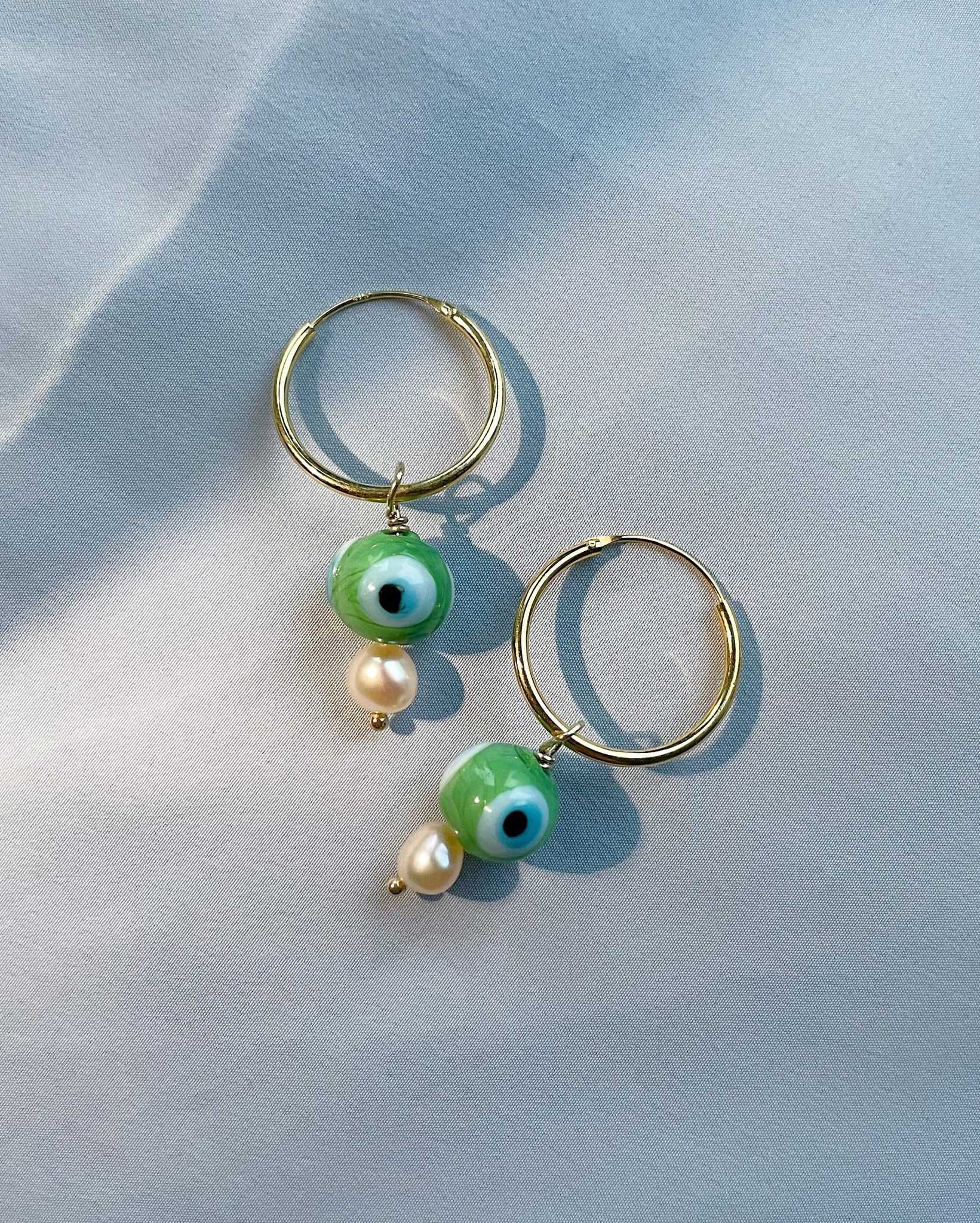Evil Eye Korvarenkaat Vihreä