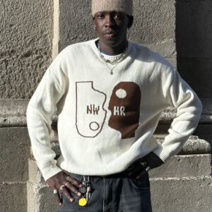 Faces Sweater